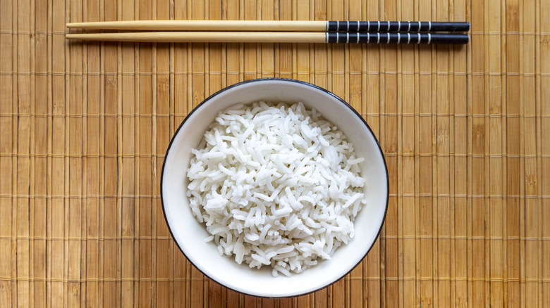 bowl of rice with chopsticks