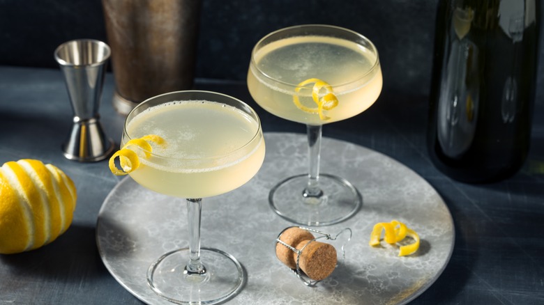 cocktails with twisted lemon garnish