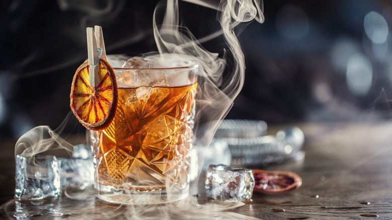 old fashioned cocktail with smoked ice