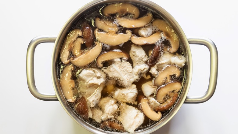 Mushrooms in pot of water