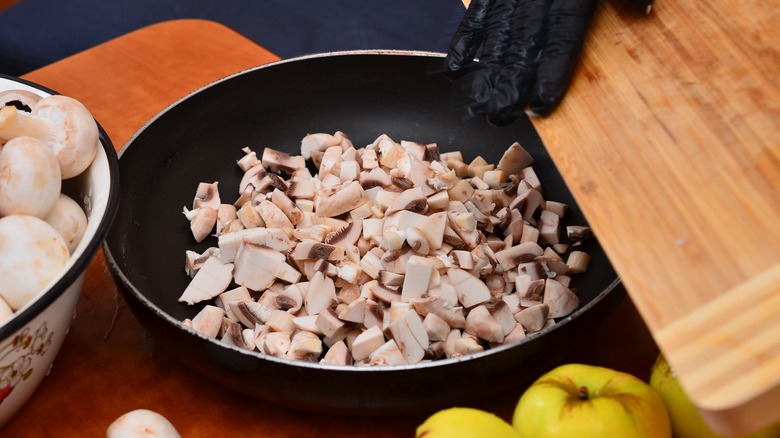 Diced mushrooms in skillet