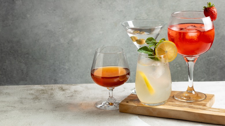 Assorted cocktails on cutting board