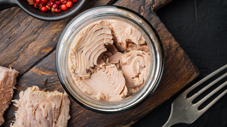 Tuna in a jar with fork