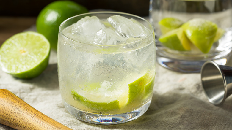 caipirinha cocktail and fresh lime
