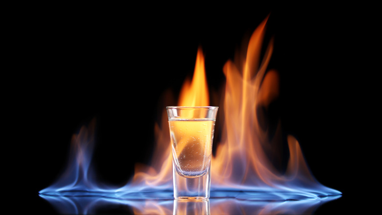 Clear shot glass on fire