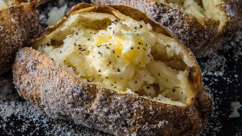 salt crusted baked potatoes with butter