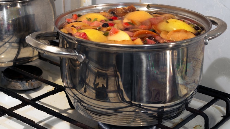 fruit compote cooking on stove