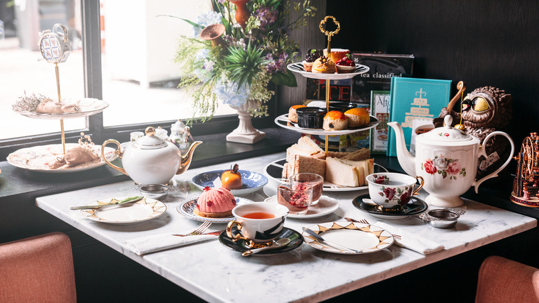 traditional English tea by window of teahouse