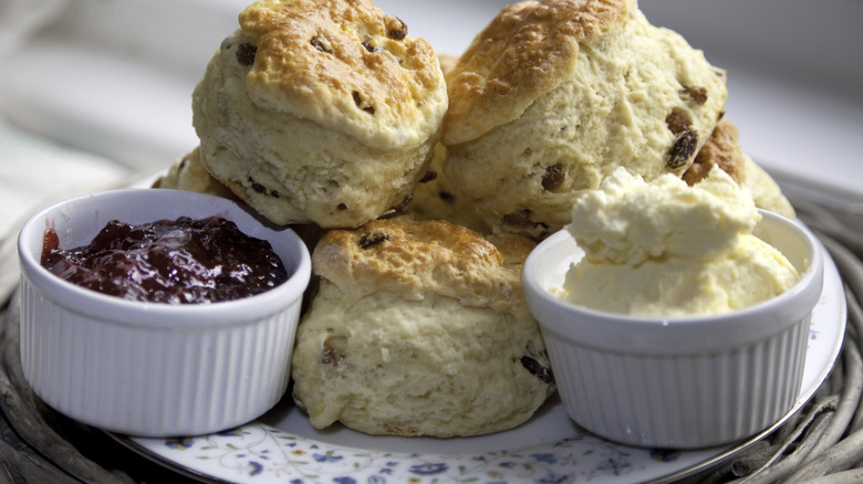 scones with pots of clotted cream and jam