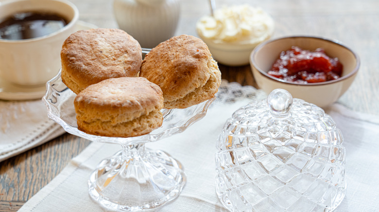 scones with pots of clotted cream and jam