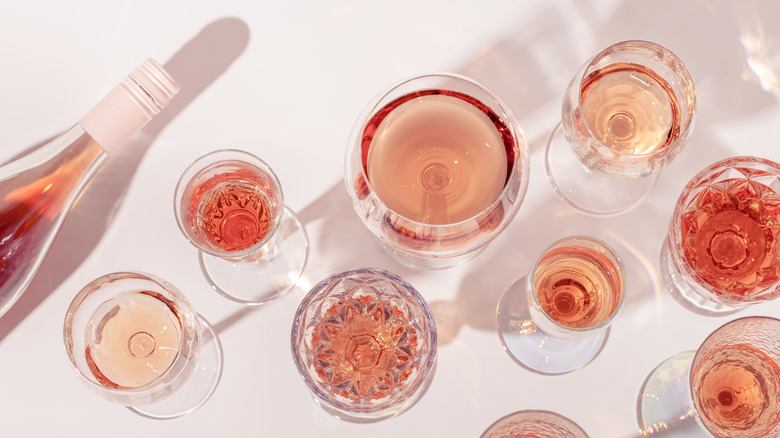 a top down view of different glasses of rose