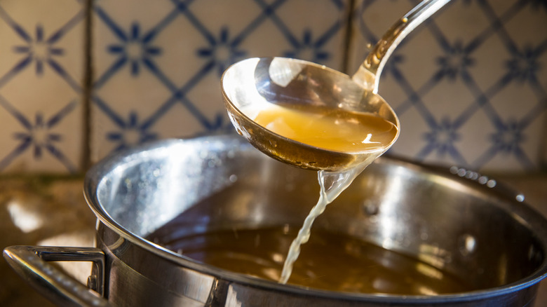 ladle and pot of broth