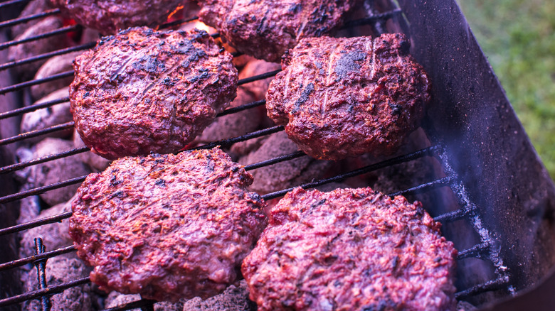 game burgers on barbeque grill