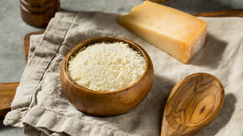 bowl of grated parmesan cheese