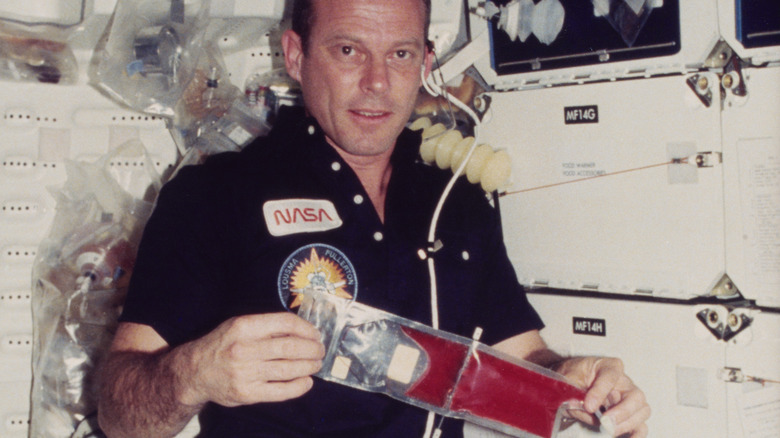 NASA astronaut with strawberries in space
