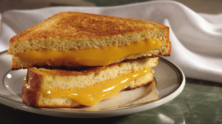 Cheese melting over sandwich edges 