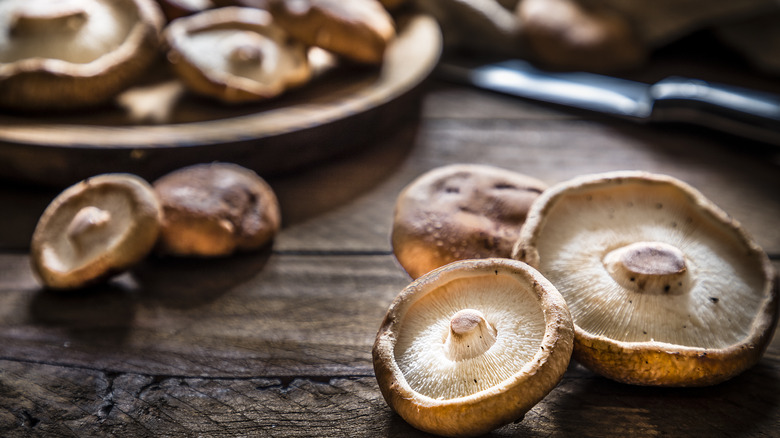Shiitake mushrooms on wooden table