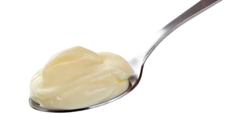 Creamy dessert in a spoon