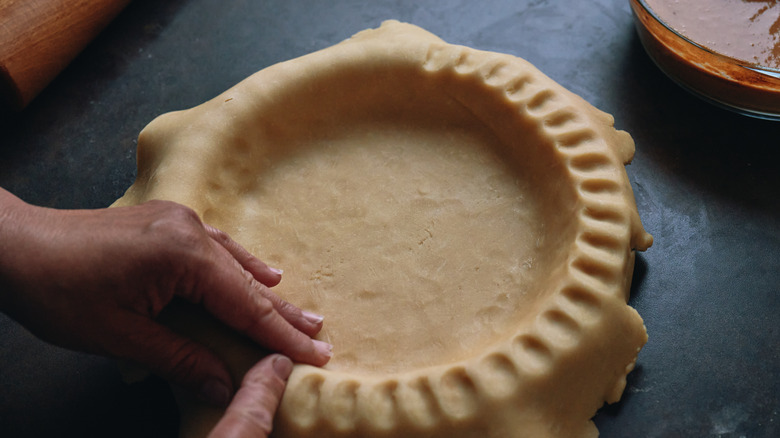 Crimped pie crust in pan