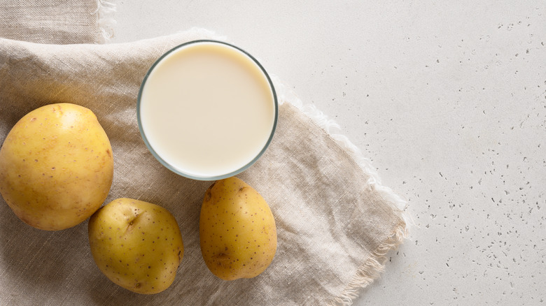 glass of milk with potatoes