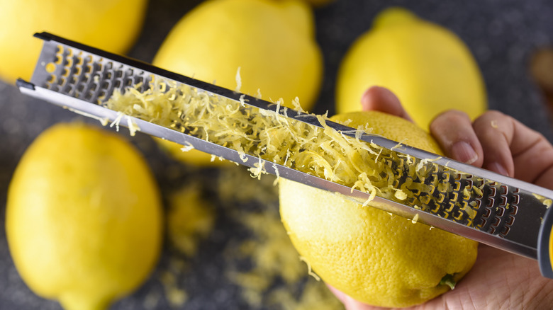 Hand making lemon zest
