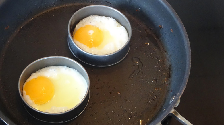 fried eggs in cooking rings