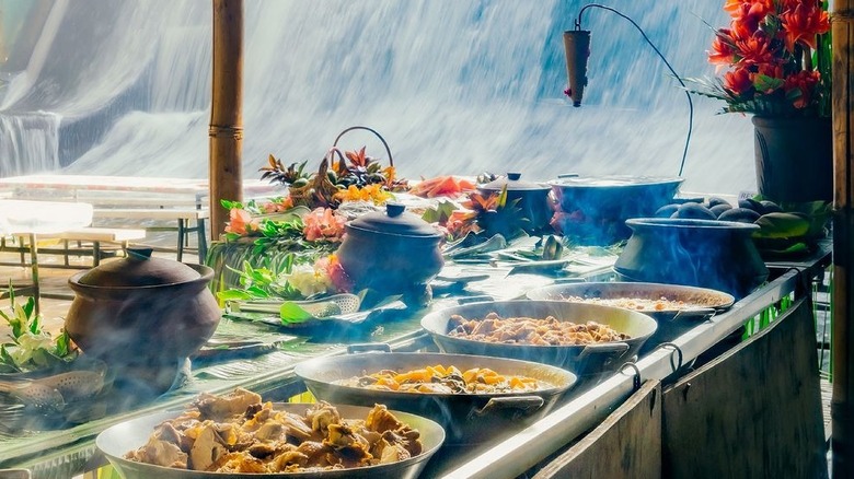 Buffet in front of waterfall