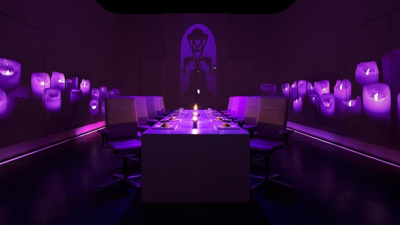 Dining room lit in purple