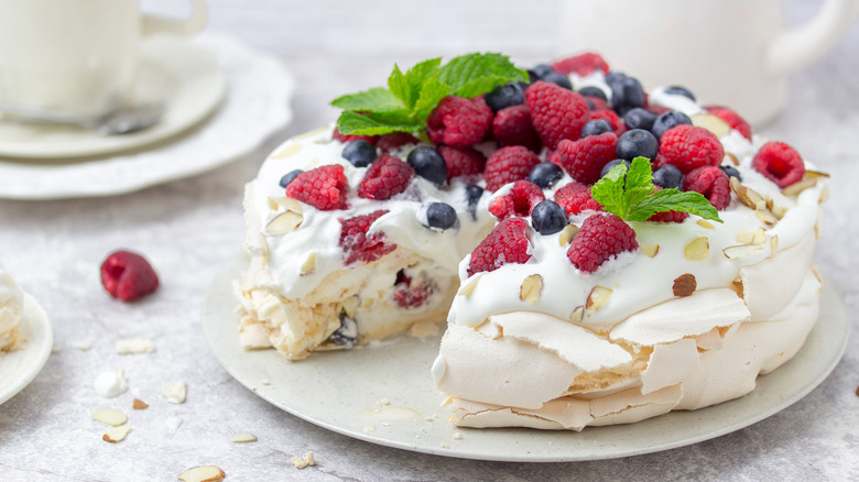 close-up of blueberry and raspberry pavlova