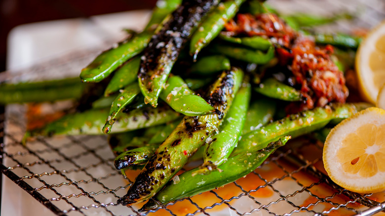 grilled edamame on a grill grate