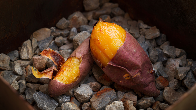 sweet potatoes over charcoal 