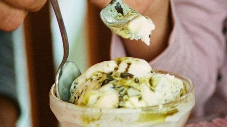 Ice cream topped with pumpkin seed oil