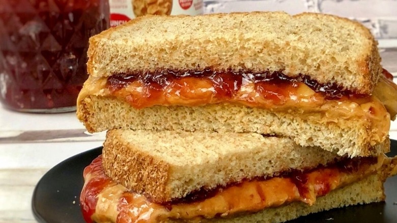 Peanut butter and jelly sandwich cut in half