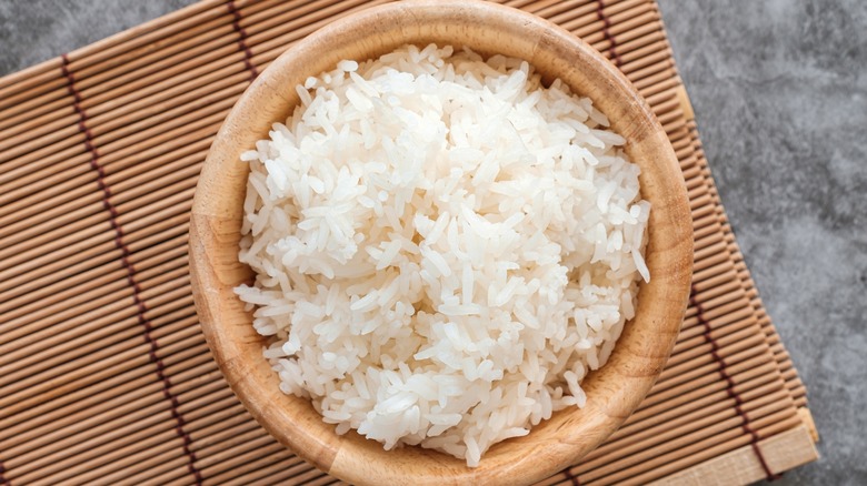 rice in wooden bowl