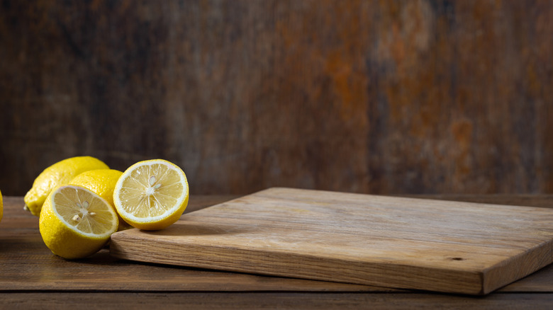 lemons on cutting board