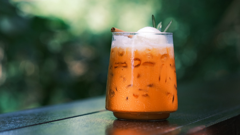 thai iced tea on bench