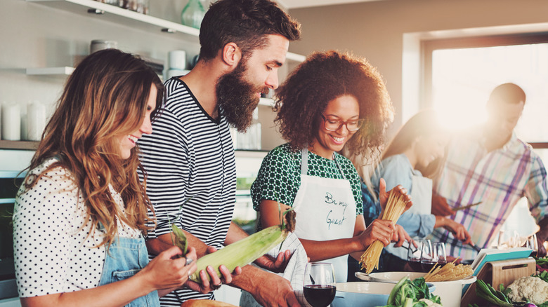 friends cooking while talking