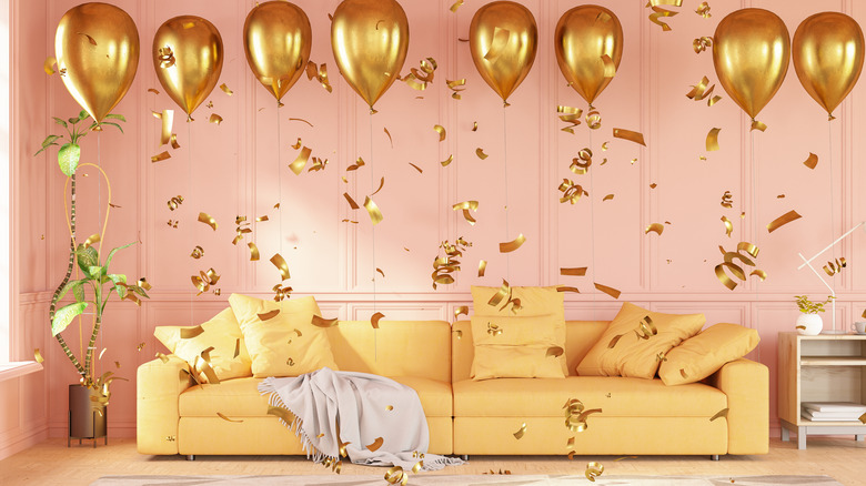 a room decorated with balloons