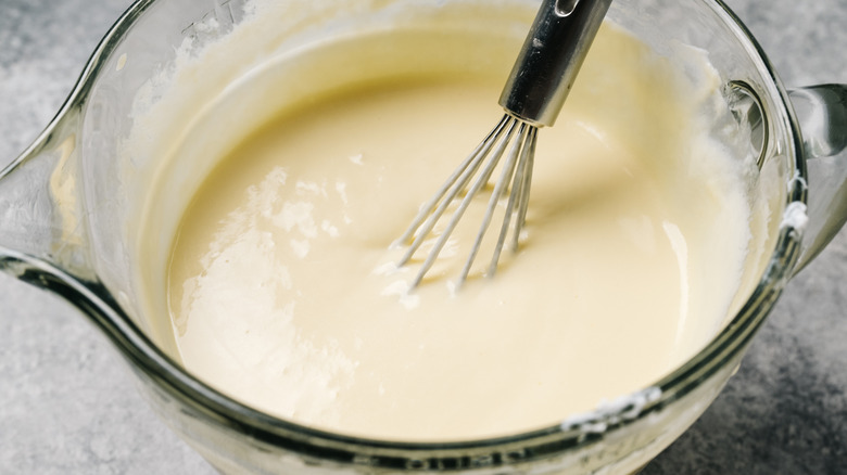 A bowl of crème anglaise, a traditional stirred custard