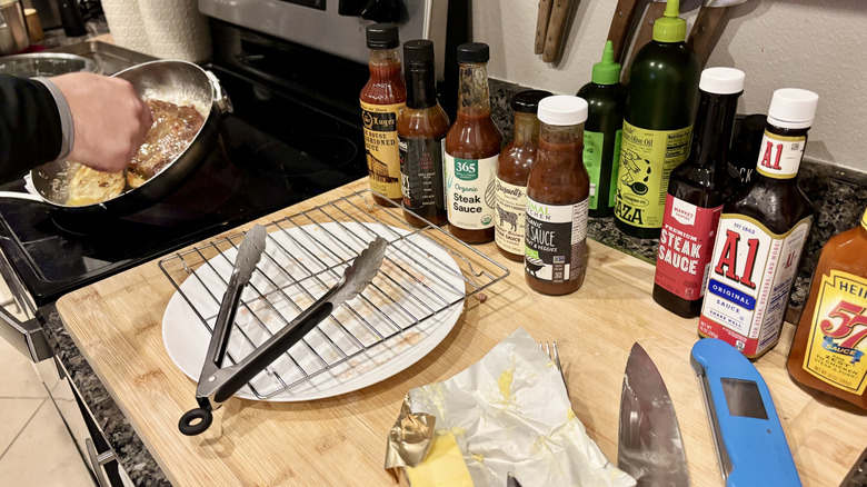 making ribeye and sauces lined up