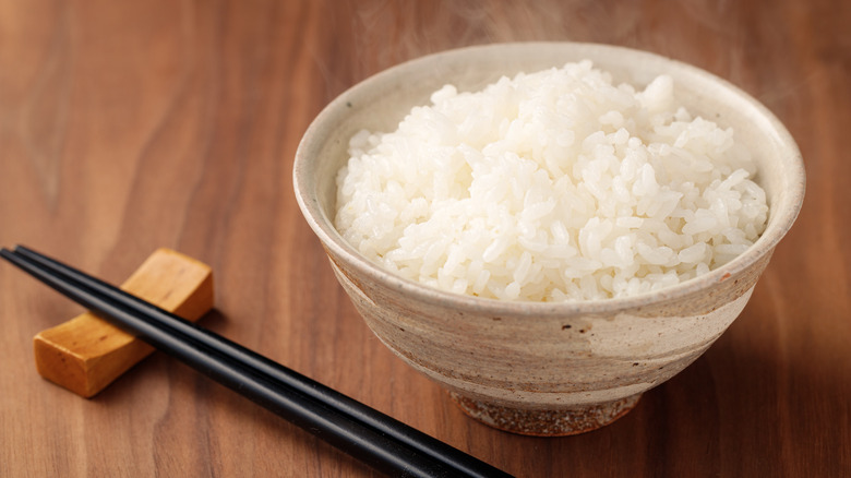 sticky rice with chopsticks
