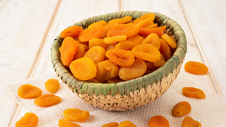 A bowl of dried apricots.