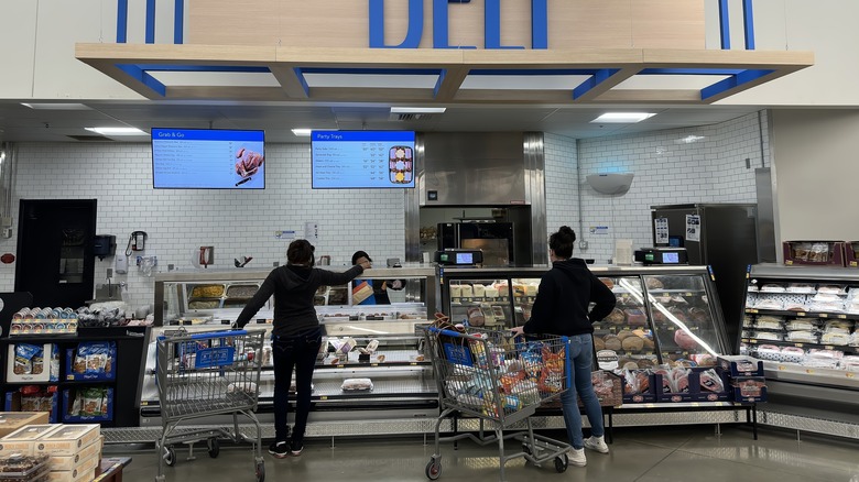 Customers ordering from a Walmart deli