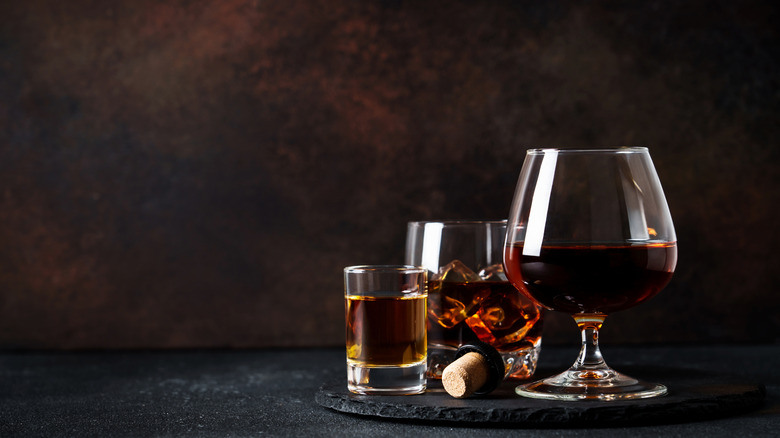 glasses of Scotch whisky on a stone table