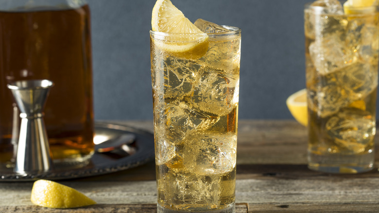 Scotch and soda with lemon in highball glass