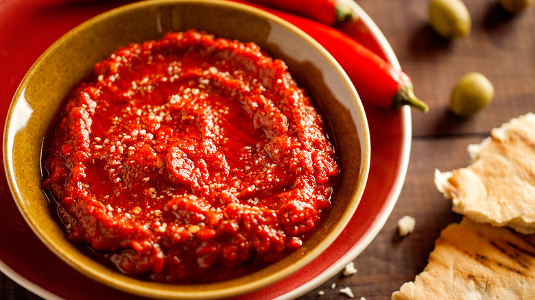 Harissa paste with peppers and flatbread.