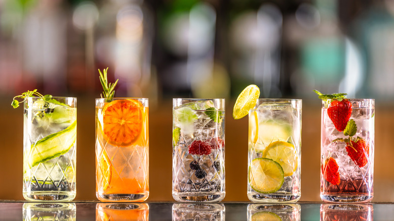 Simple gin cocktails with various garnishes