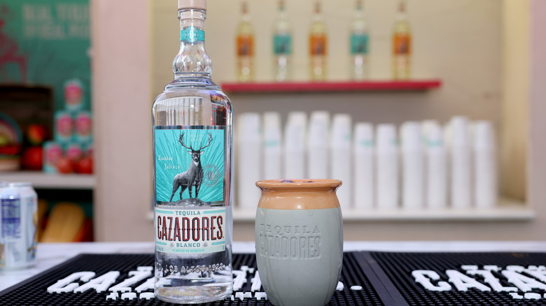 Cazadores Blanco bottle with cocktail