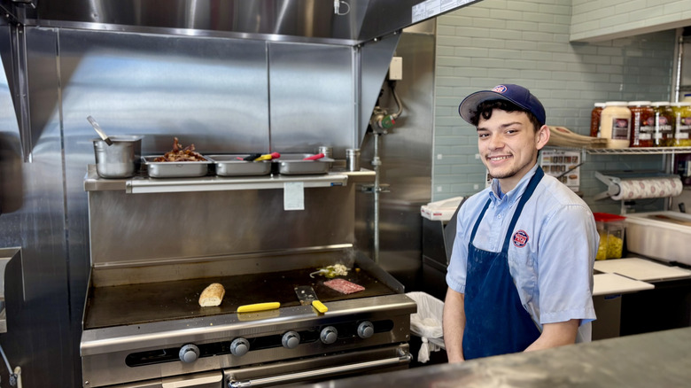 Jersey Mike's employee on the grill