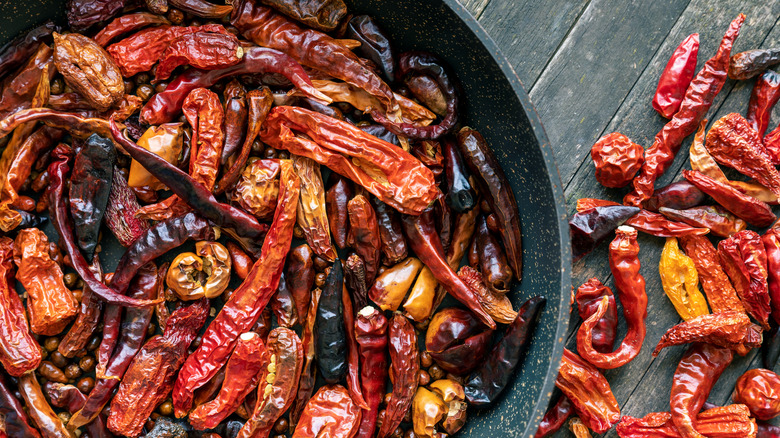 Different toasted chilies prepped for crushing